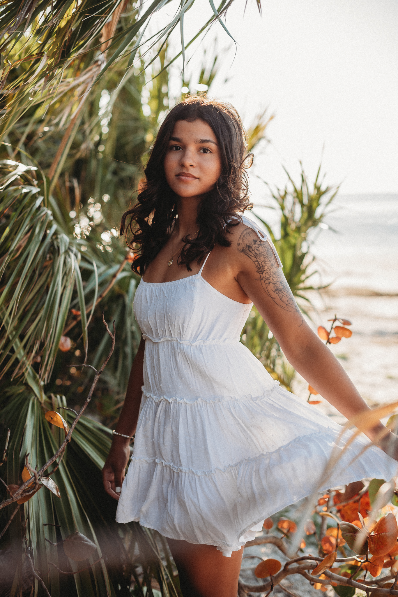 Senior girl beach photo session. Sunset Beach, Tarpon Springs, Florida.