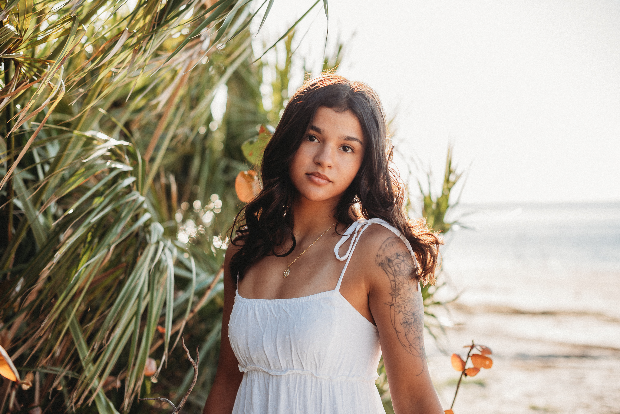 Senior girl beach photo session. Sunset Beach, Tarpon Springs, Florida.