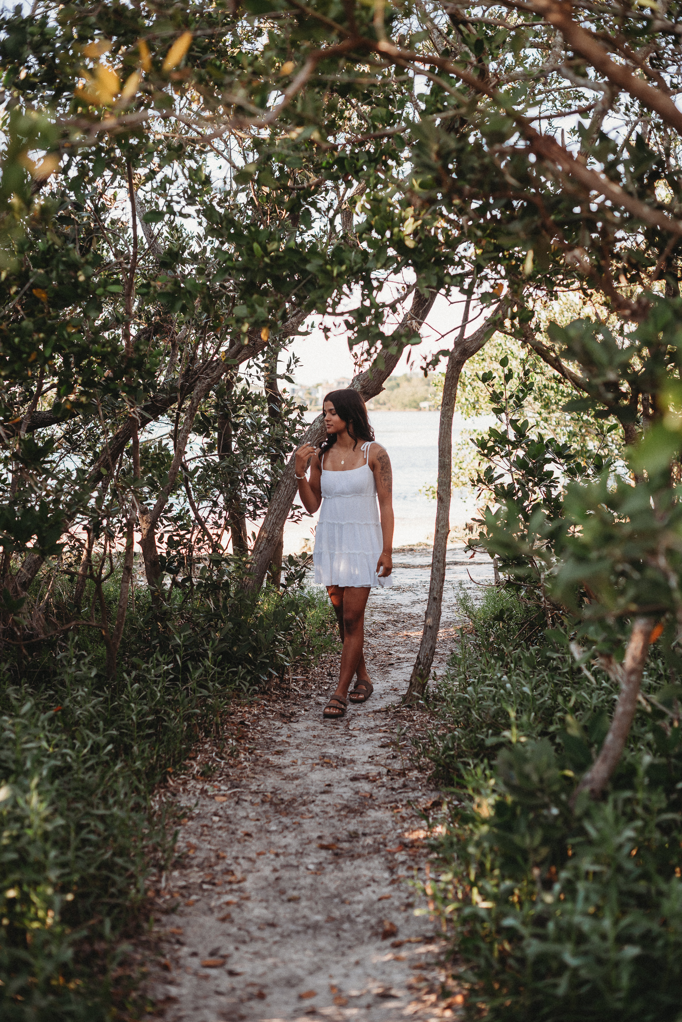 Senior girl beach photo session. Sunset Beach, Tarpon Springs, Florida.