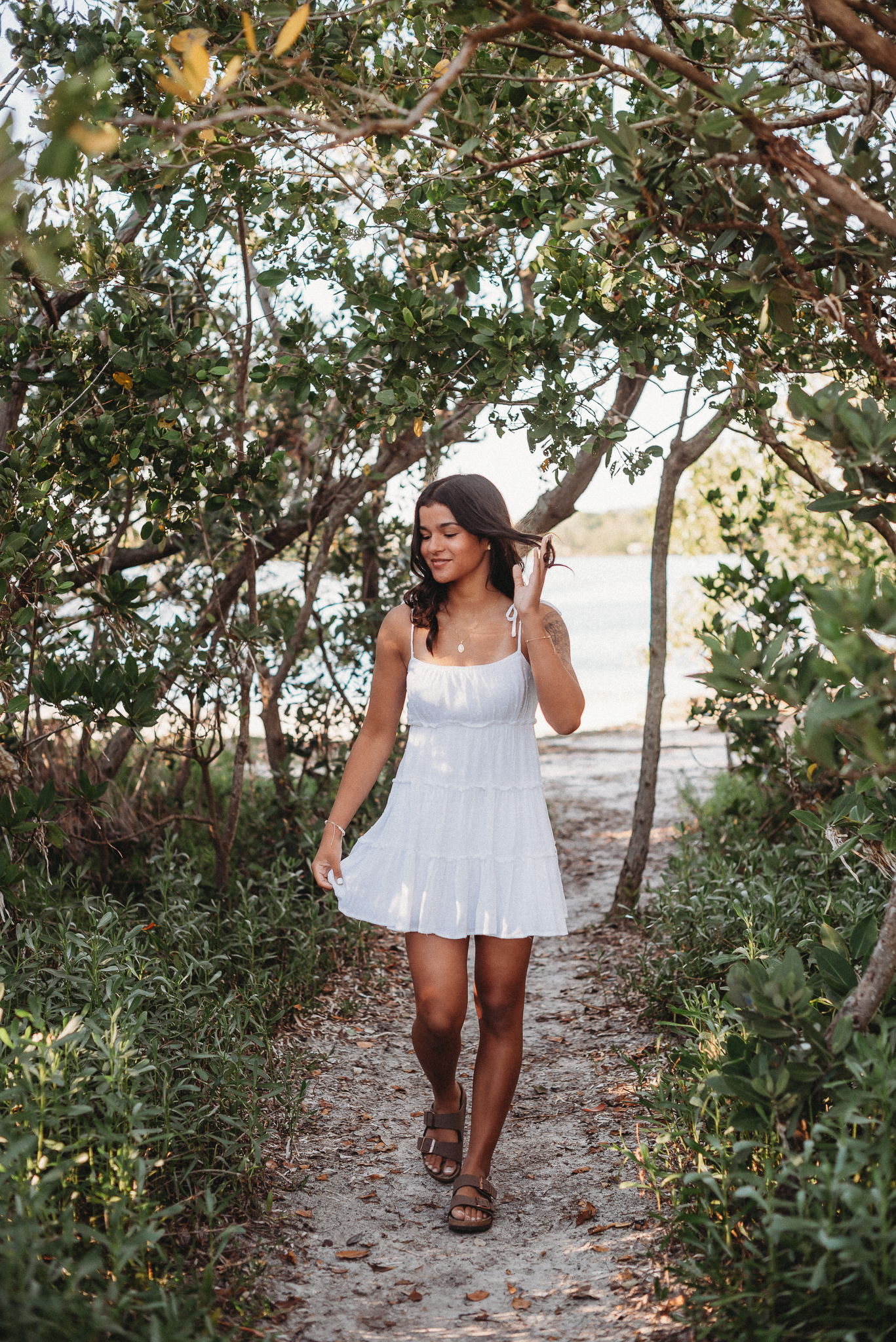 Senior girl beach photo session. Sunset Beach, Tarpon Springs, Florida.