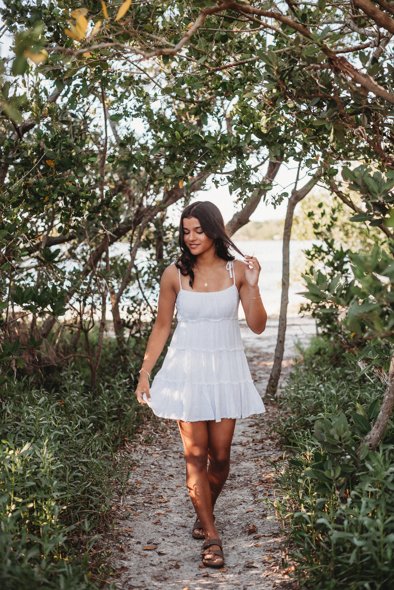 Senior girl beach photo session. Sunset Beach, Tarpon Springs, Florida.