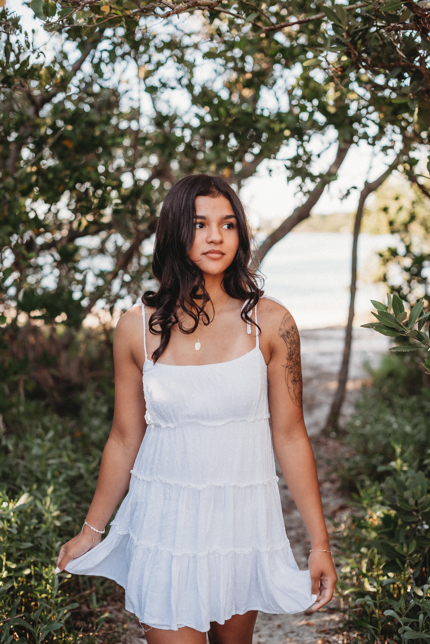 Senior girl beach photo session. Sunset Beach, Tarpon Springs, Florida.