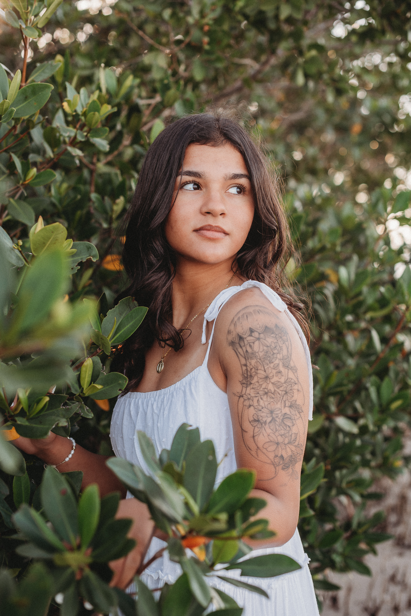 Senior girl beach photo session. Sunset Beach, Tarpon Springs, Florida.
