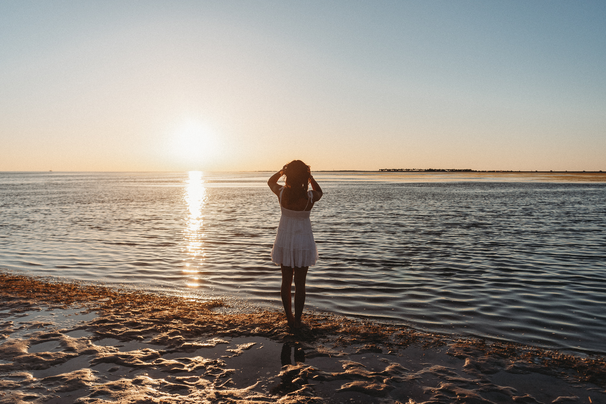 Senior girl beach photo session. Sunset Beach, Tarpon Springs, Florida.
