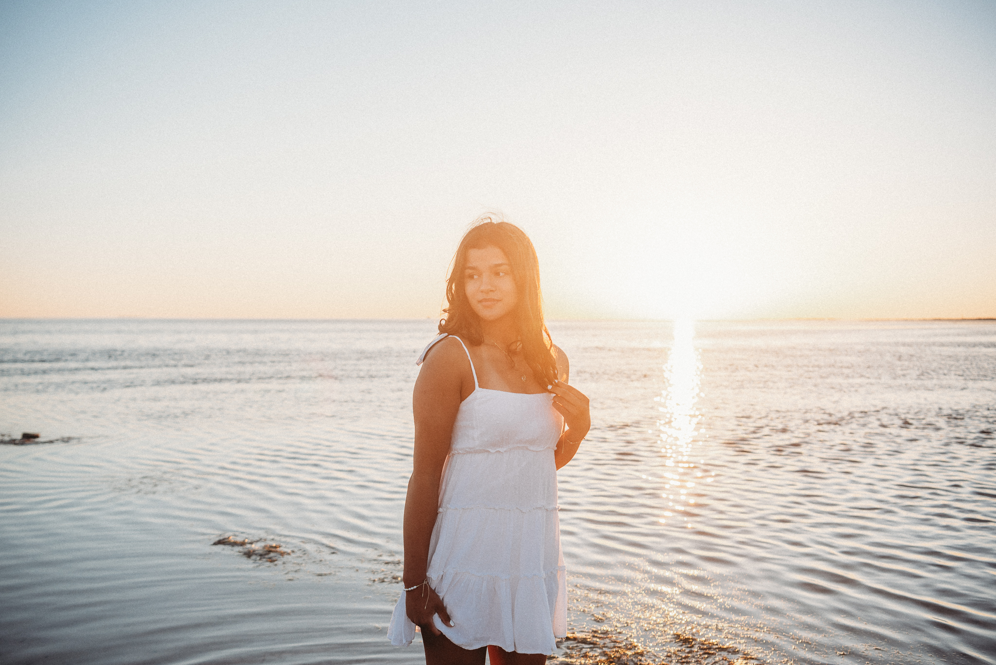 Senior girl beach photo session. Sunset Beach, Tarpon Springs, Florida.