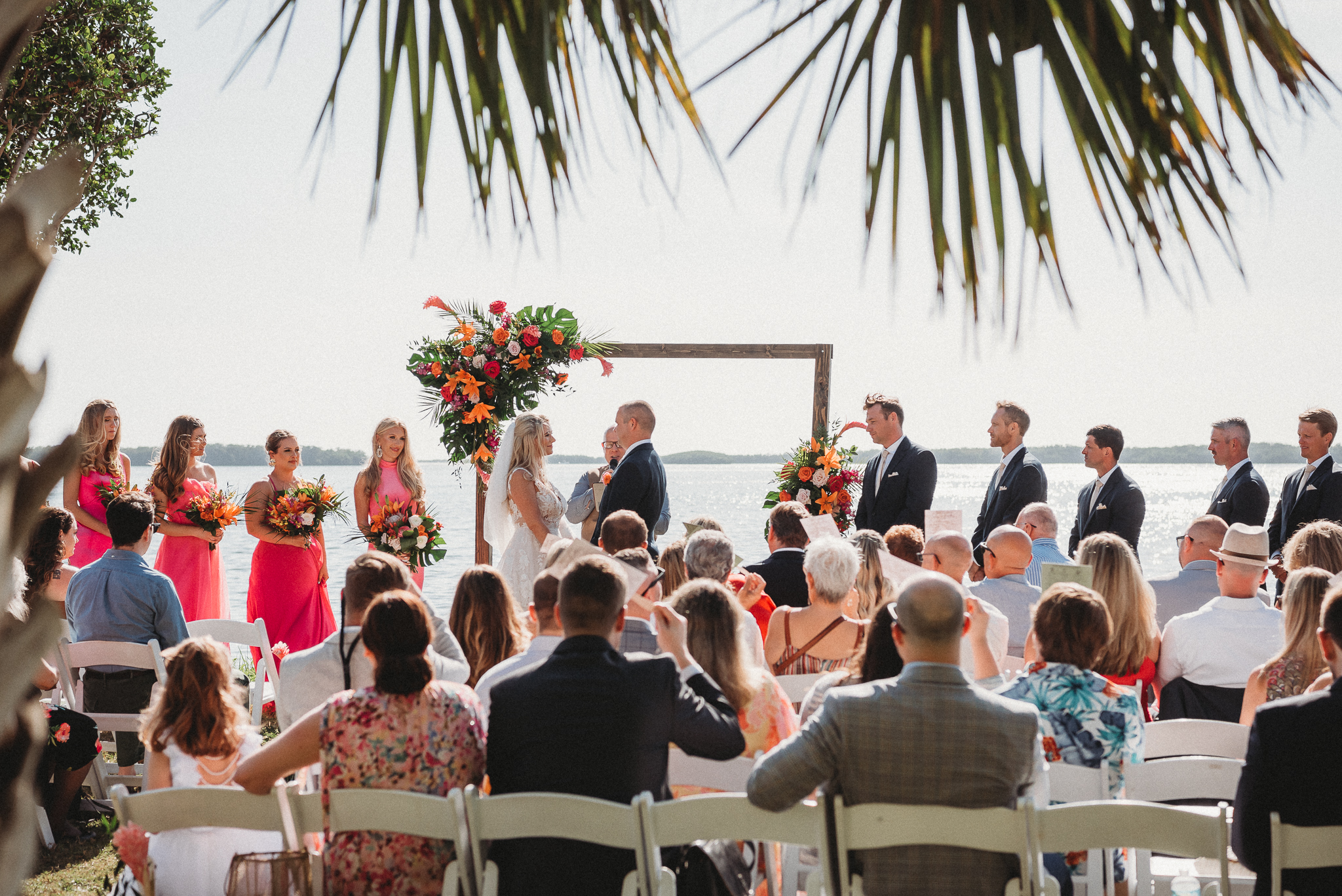 Waterfront wedding ceremony at Tampa Bay Watch in St. Petersburg, Florida overlooking Tampa Bay