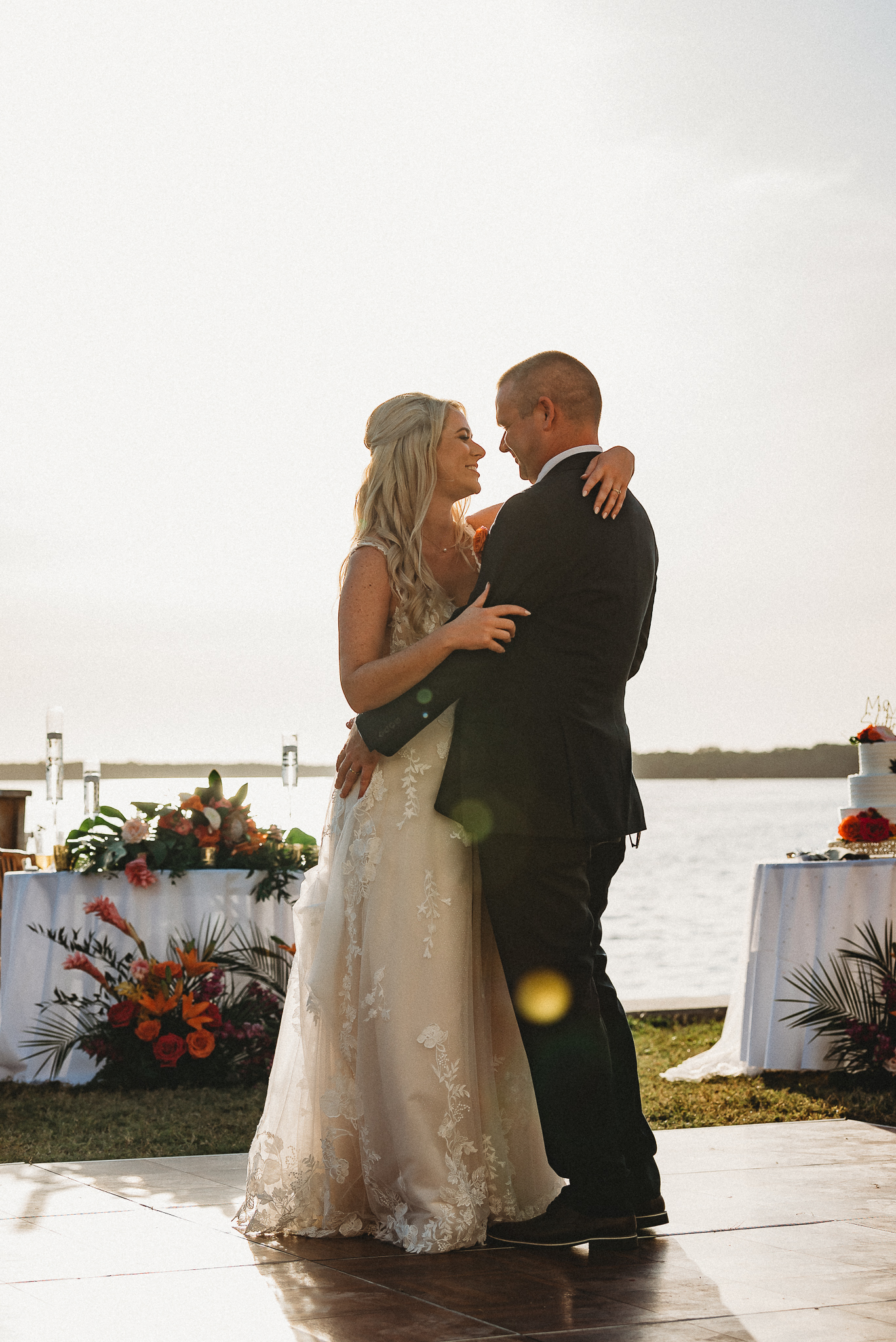 Golden hour First dance during a joyful Tampa Bay Watch wedding reception