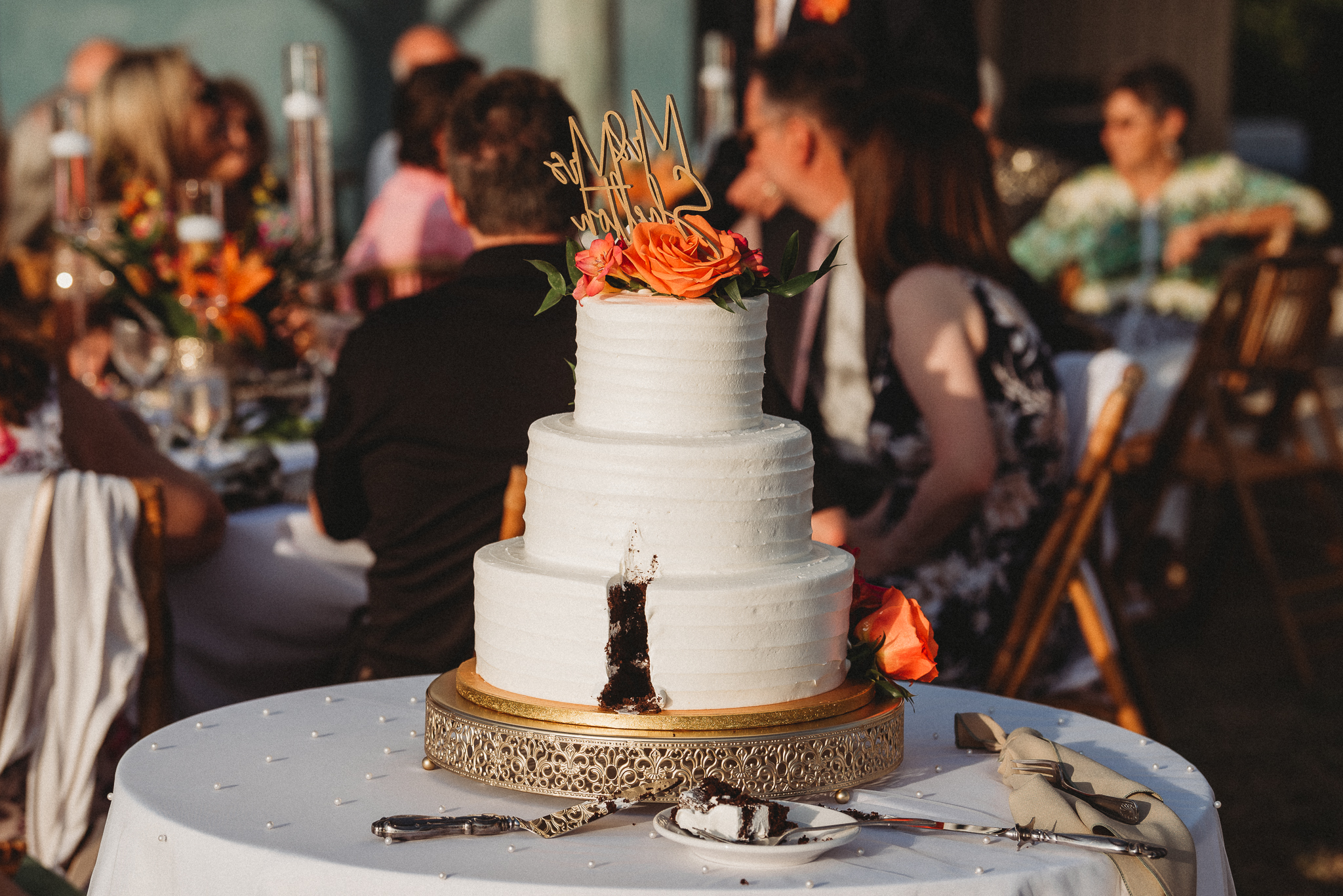 Cinematic reception detail of wedding cake at St. Petersburg Florida wedding