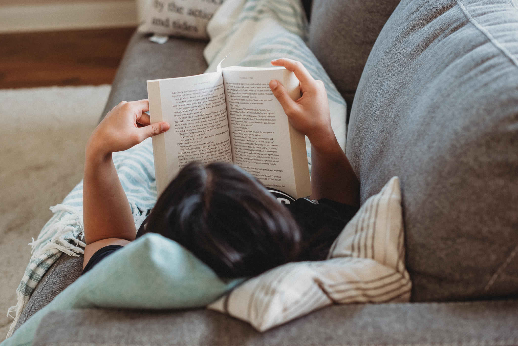Faith-filled homeschool morning with books, Bible, and children learning at home