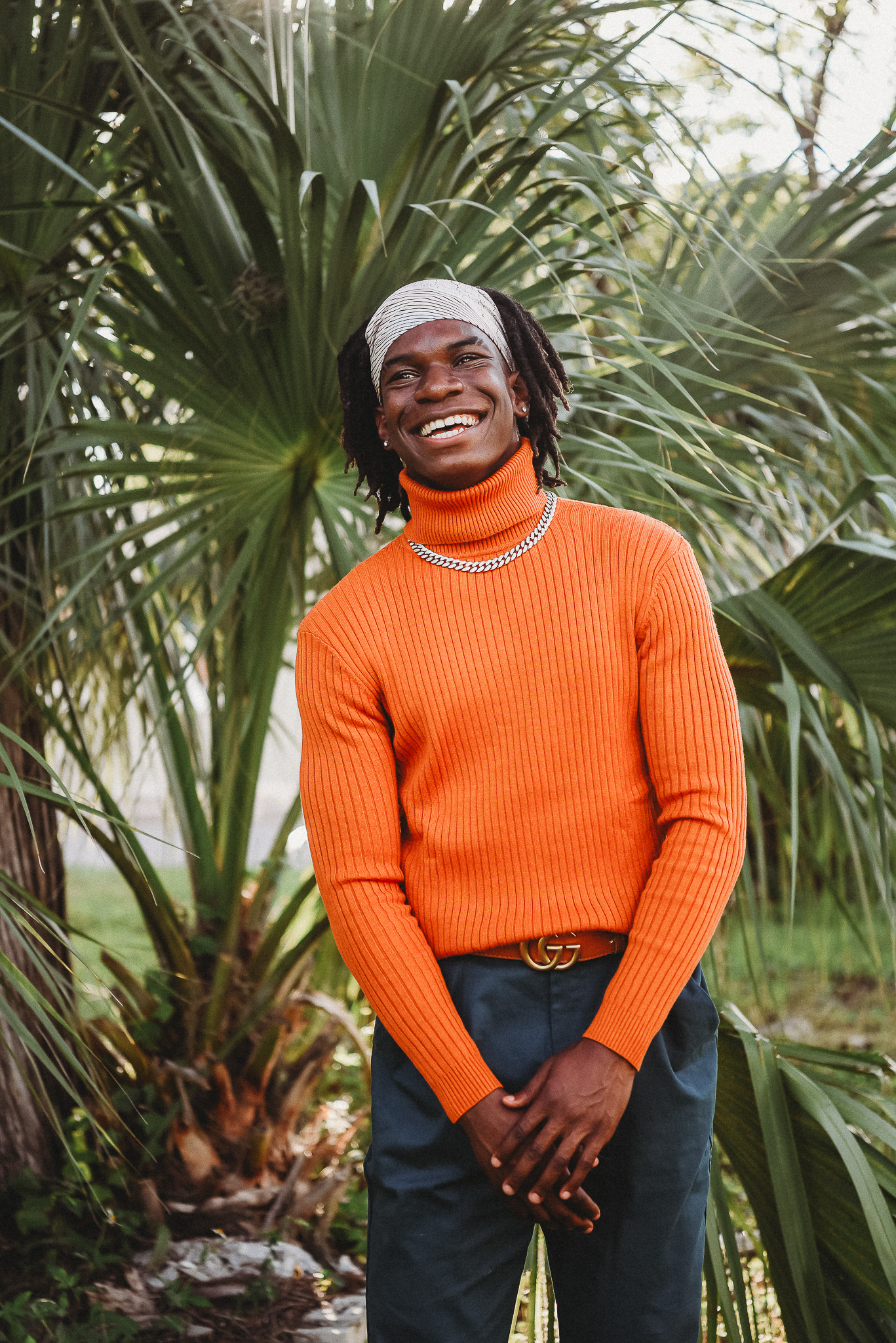 Editorial-inspired senior portraits in an urban Florida location with tropical vibes